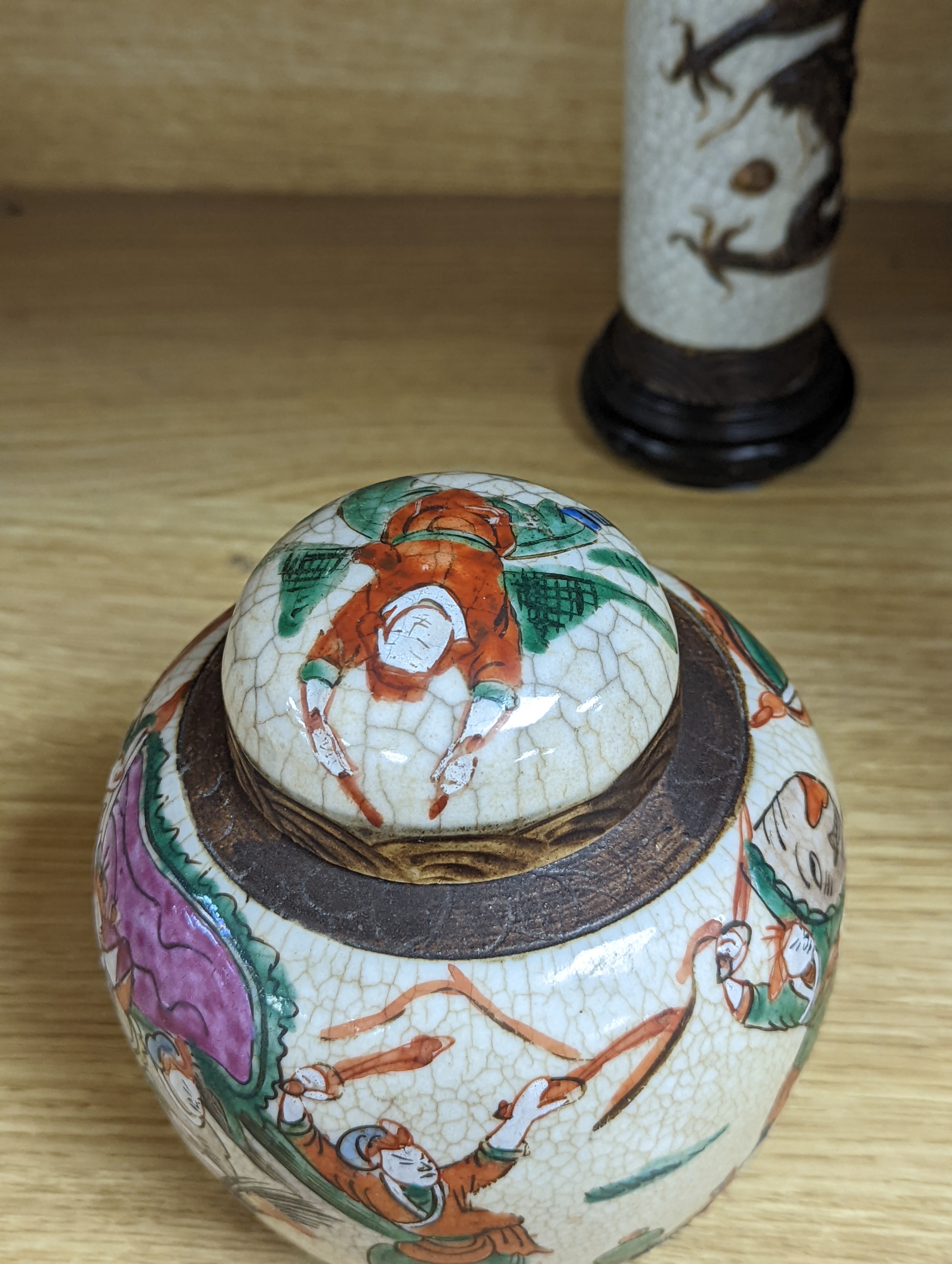 A Chinese famille verte crackle glaze jar and cover, 14.5cm, two famille rose dishes and a crackle glaze ‘dragon’ vase, all late 19th/early 20th century